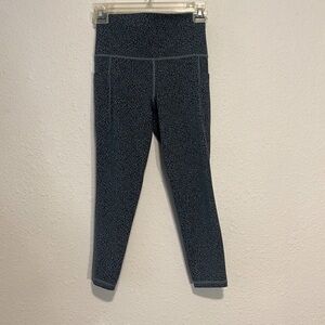 Athleta Salutation stash pocket xsp